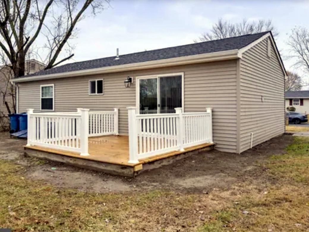 New deck with white vinyl railings