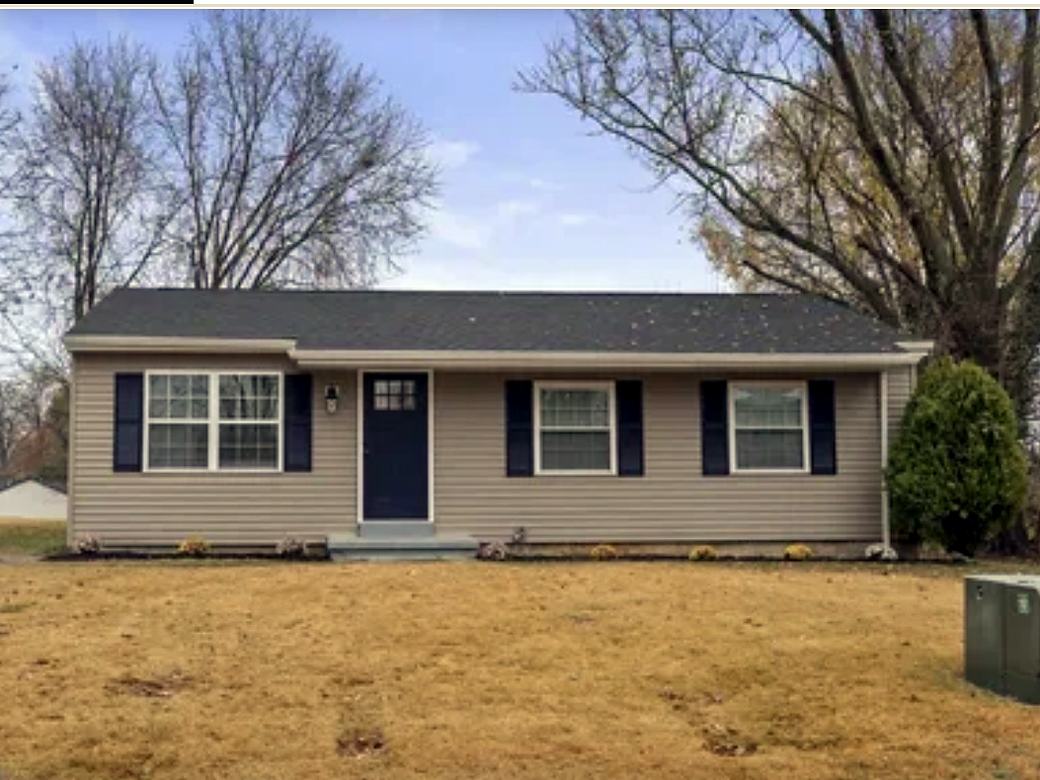 Ranch home with new windows, shutters and front door